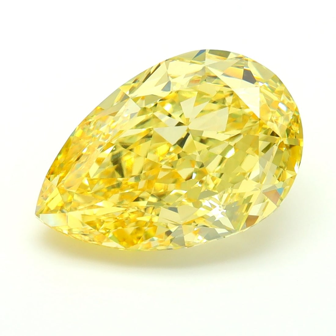 Loose Diamond - PEAR 6.1ct Fancy Vivid Yellow VS1: Loose Diamond - PEAR 6.1ct Fancy Vivid Yellow VS1 Source: This is a real non-mined Diamond that has been grown in a lab Shape: PEAR Carats: 6.1 Color: Fancy Vivid Yellow Certification: IGI The Diamond