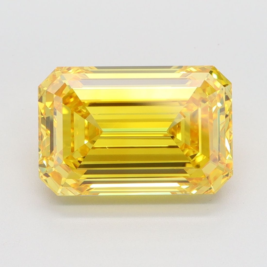Loose Diamond - EMERALD 5.05ct Fancy Vivid Yellow VS1: Loose Diamond - EMERALD 5.05ct Fancy Vivid Yellow VS1 Source: This is a real non-mined Diamond that has been grown in a lab Shape: EMERALD Carats: 5.05 Color: Fancy Vivid Yellow Certification: IGI Vid
