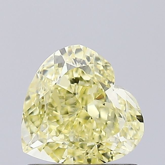 Loose Diamond - HEART 1.0ct Fancy Intense Yellow VVS2: Loose Diamond - HEART 1.0ct Fancy Intense Yellow VVS2 Source: This is a real non-mined Diamond that has been grown in a lab Shape: HEART Carats: 1.0 Color: Fancy Intense Yellow Certification: IGI Vide