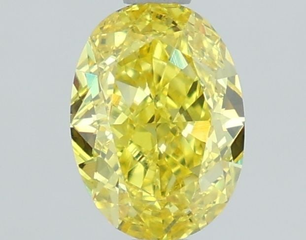 Loose Diamond - OVAL 1.2ct Fancy Vivid Yellow VS1: Loose Diamond - OVAL 1.2ct Fancy Vivid Yellow VS1 Source: This is a real non-mined Diamond that has been grown in a lab Shape: OVAL Carats: 1.2 Color: Fancy Vivid Yellow Certification: IGI Video: