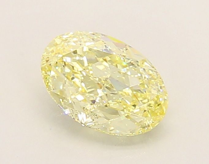 Loose Diamond - OVAL 1.04ct Fancy Yellow VS1: Loose Diamond - OVAL 1.04ct Fancy Yellow VS1 Source: This is a real non-mined Diamond that has been grown in a lab Shape: OVAL Carats: 1.04 Color: Fancy Yellow Certification: IGI Video: