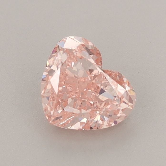 Loose Diamond - HEART 0.84ct Fancy Vivid Pink VS2: Loose Diamond - HEART 0.84ct Fancy Vivid Pink VS2 Source: This is a real non-mined Diamond that has been grown in a lab Shape: HEART Carats: 0.84 Color: Fancy Vivid Pink Certification: IGI Video: