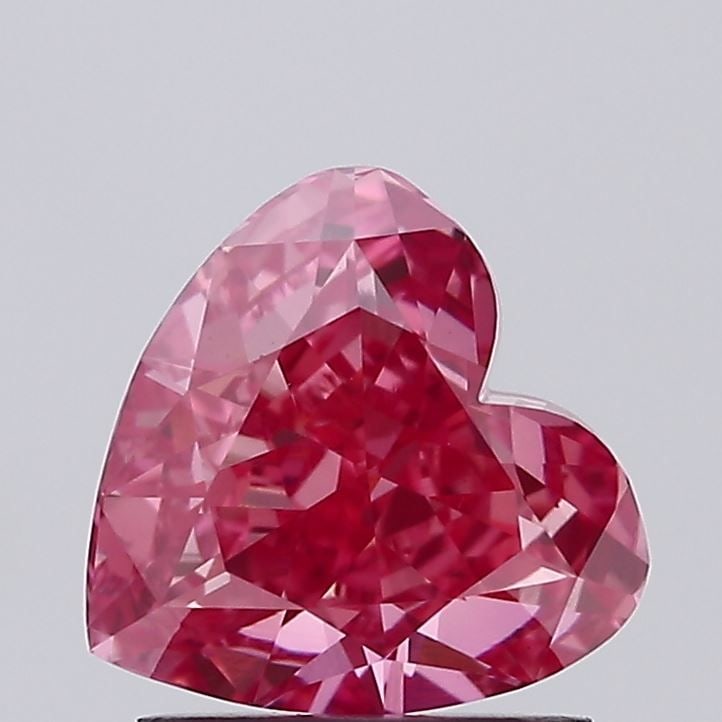 Loose Diamond - HEART 1.55ct Fancy Vivid Pink VS1: Loose Diamond - HEART 1.55ct Fancy Vivid Pink VS1 Source: This is a real non-mined Diamond that has been grown in a lab Shape: HEART Carats: 1.55 Color: Fancy Vivid Pink Certification: IGI Video: