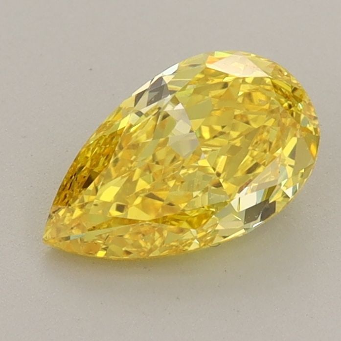 Loose Diamond - PEAR 1.08ct Fancy Vivid Yellow VVS2: Loose Diamond - PEAR 1.08ct Fancy Vivid Yellow VVS2 Source: This is a real non-mined Diamond that has been grown in a lab Shape: PEAR Carats: 1.08 Color: Fancy Vivid Yellow Certification: IGI Video: