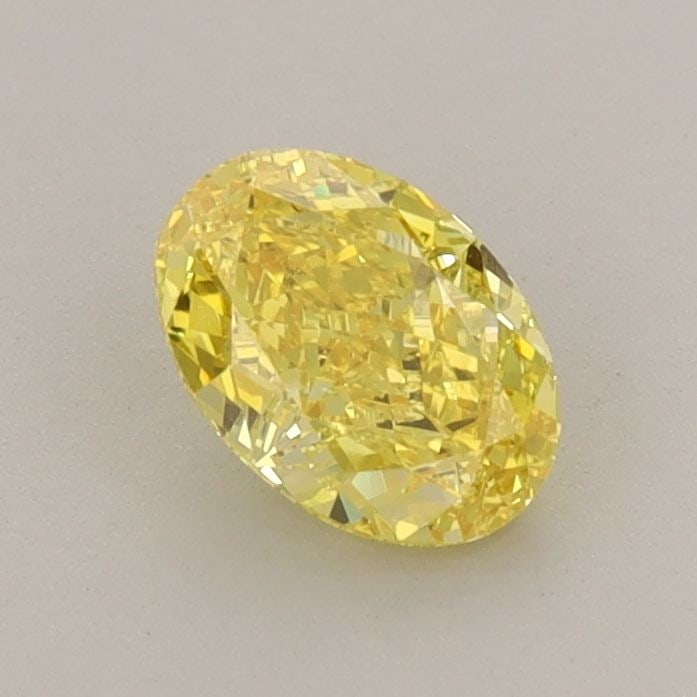 Loose Diamond - OVAL 0.74ct Fancy Vivid Yellow VVS2: Loose Diamond - OVAL 0.74ct Fancy Vivid Yellow VVS2 Source: This is a real non-mined Diamond that has been grown in a lab Shape: OVAL Carats: 0.74 Color: Fancy Vivid Yellow Certification: IGI Video: