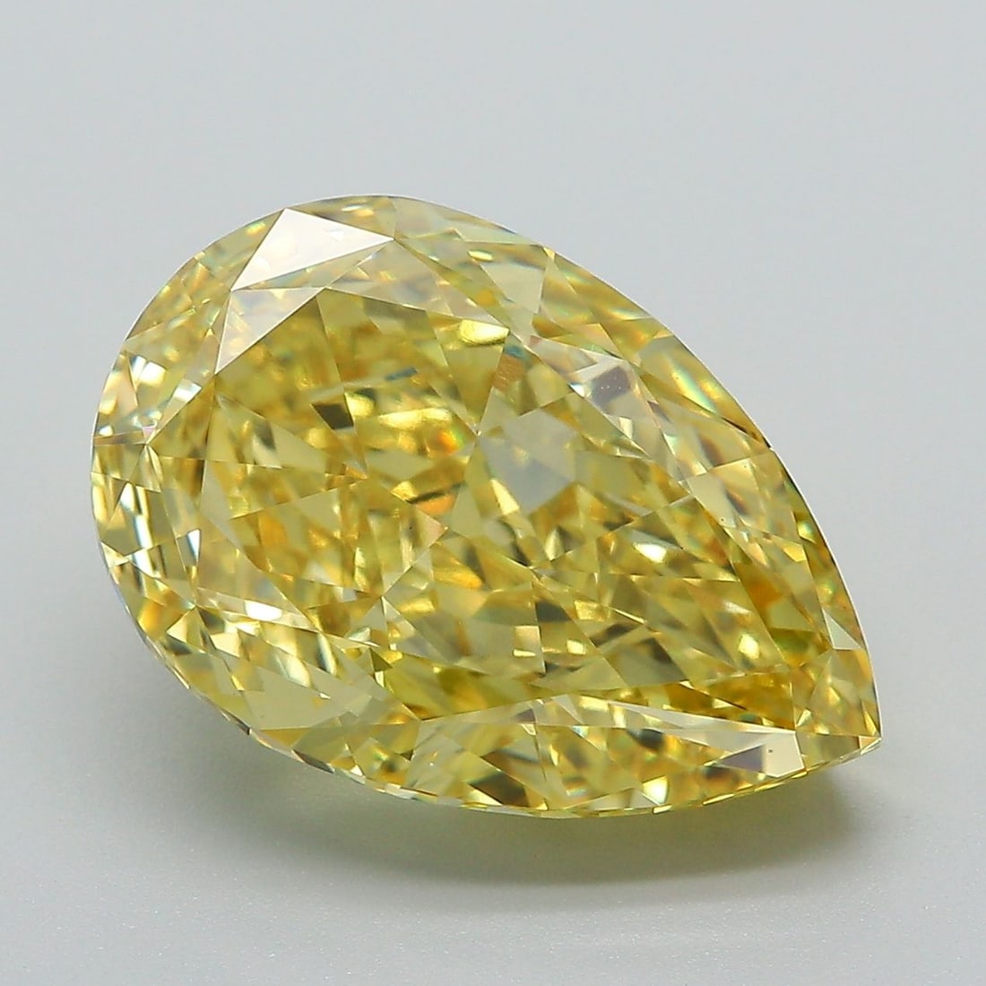 Loose Diamond - PEAR 8.35ct Fancy Vivid Yellow VS1: Loose Diamond - PEAR 8.35ct Fancy Vivid Yellow VS1 Source: This is a real non-mined Diamond that has been grown in a lab Shape: PEAR Carats: 8.35 Color: Fancy Vivid Yellow Certification: IGI Video: