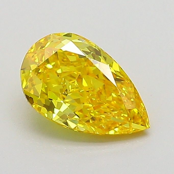 Loose Diamond - PEAR 0.94ct Fancy Vivid Yellow VS1: Loose Diamond - PEAR 0.94ct Fancy Vivid Yellow VS1 Source: This is a real non-mined Diamond that has been grown in a lab Shape: PEAR Carats: 0.94 Color: Fancy Vivid Yellow Certification: IGI Video: