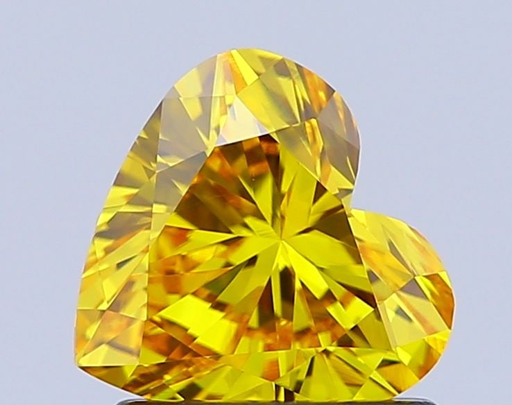 Loose Diamond - HEART 1.06ct Fancy Vivid Yellow VS1: Loose Diamond - HEART 1.06ct Fancy Vivid Yellow VS1 Source: This is a real non-mined Diamond that has been grown in a lab Shape: HEART Carats: 1.06 Color: Fancy Vivid Yellow Certification: IGI Video: