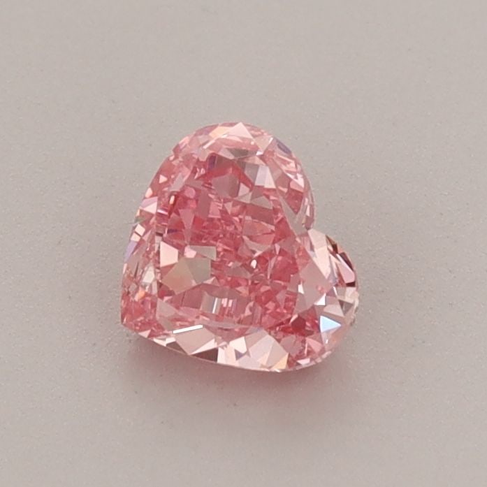 Loose Diamond - HEART 0.55ct Fancy Vivid Pink VS1: Loose Diamond - HEART 0.55ct Fancy Vivid Pink VS1 Source: This is a real non-mined Diamond that has been grown in a lab Shape: HEART Carats: 0.55 Color: Fancy Vivid Pink Certification: IGI Video: