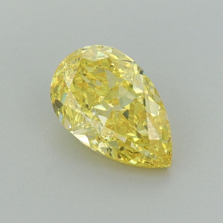 Loose Diamond - PEAR 1.02ct Fancy Vivid Yellow VVS1: Loose Diamond - PEAR 1.02ct Fancy Vivid Yellow VVS1 Source: This is a real non-mined Diamond that has been grown in a lab Shape: PEAR Carats: 1.02 Color: Fancy Vivid Yellow Certification: IGI Video: