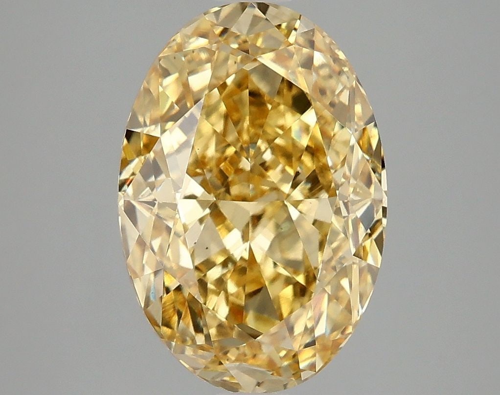 Loose Diamond - OVAL 4.03ct Fancy Vivid Yellow VS1: Loose Diamond - OVAL 4.03ct Fancy Vivid Yellow VS1 Source: This is a real non-mined Diamond that has been grown in a lab Shape: OVAL Carats: 4.03 Color: Fancy Vivid Yellow Certification: IGI Video: