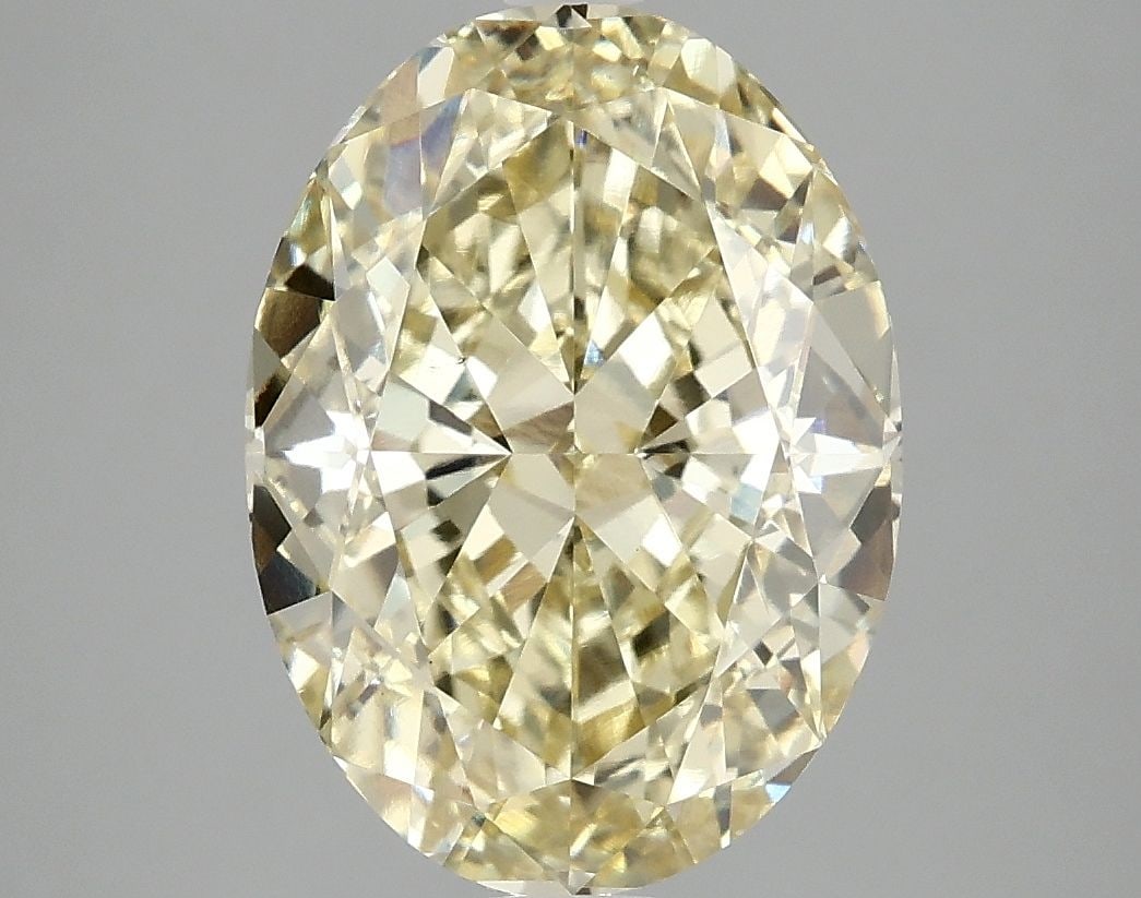 Loose Diamond - OVAL 5.09ct Fancy Vivid Yellow VS1: Loose Diamond - OVAL 5.09ct Fancy Vivid Yellow VS1 Source: This is a real non-mined Diamond that has been grown in a lab Shape: OVAL Carats: 5.09 Color: Fancy Vivid Yellow Certification: IGI Video: