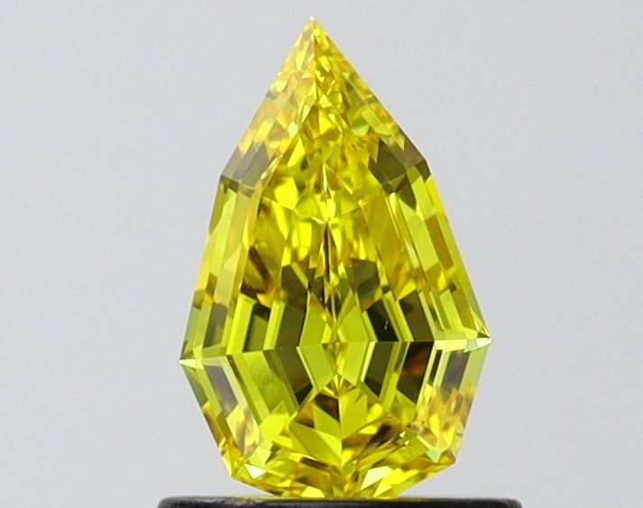 Loose Diamond - PEAR 0.72ct Fancy Vivid Yellow VVS1: Loose Diamond - PEAR 0.72ct Fancy Vivid Yellow VVS1 Source: This is a real non-mined Diamond that has been grown in a lab Shape: PEAR Carats: 0.72 Color: Fancy Vivid Yellow Certification: IGI Video: