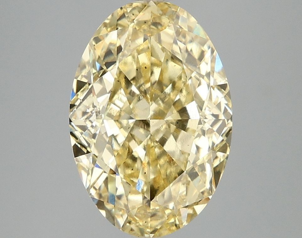 Loose Diamond - OVAL 4.02ct Fancy Vivid Yellow VS2: Loose Diamond - OVAL 4.02ct Fancy Vivid Yellow VS2 Source: This is a real non-mined Diamond that has been grown in a lab Shape: OVAL Carats: 4.02 Color: Fancy Vivid Yellow Certification: IGI Video: