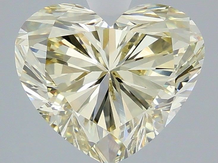 Loose Diamond - HEART 3.62ct Fancy Yellow VVS2: Loose Diamond - HEART 3.62ct Fancy Yellow VVS2 Source: This is a real non-mined Diamond that has been grown in a lab Shape: HEART Carats: 3.62 Color: Fancy Yellow Certification: IGI Video:
