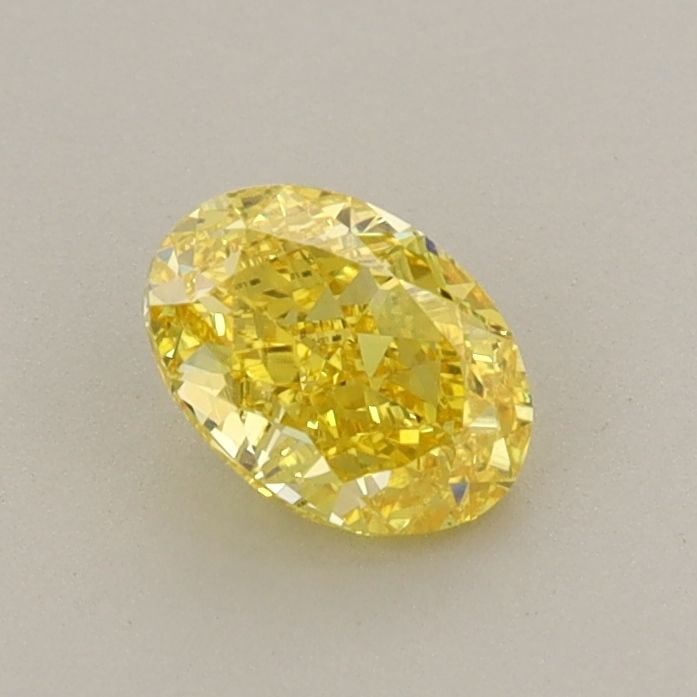 Loose Diamond - OVAL 0.64ct Fancy Vivid Yellow VVS2: Loose Diamond - OVAL 0.64ct Fancy Vivid Yellow VVS2 Source: This is a real non-mined Diamond that has been grown in a lab Shape: OVAL Carats: 0.64 Color: Fancy Vivid Yellow Certification: IGI Video: