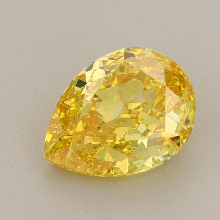 Loose Diamond - PEAR 1.23ct Fancy Vivid Yellow VS2: Loose Diamond - PEAR 1.23ct Fancy Vivid Yellow VS2 Source: This is a real non-mined Diamond that has been grown in a lab Shape: PEAR Carats: 1.23 Color: Fancy Vivid Yellow Certification: IGI Video: