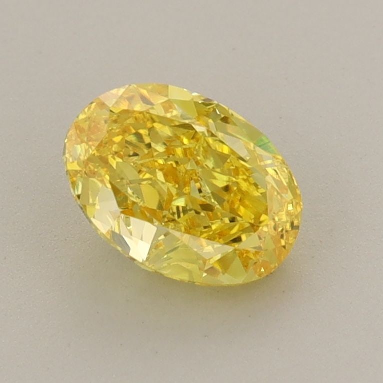 Loose Diamond - OVAL 1.01ct Fancy Vivid Yellow VS1: Loose Diamond - OVAL 1.01ct Fancy Vivid Yellow VS1 Source: This is a real non-mined Diamond that has been grown in a lab Shape: OVAL Carats: 1.01 Color: Fancy Vivid Yellow Certification: IGI The Diamo