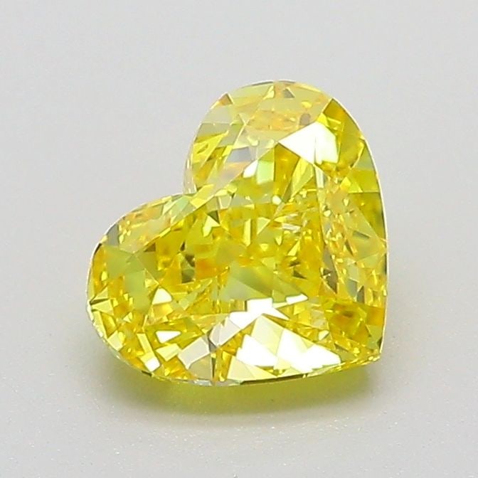 Loose Diamond - HEART 1.02ct Fancy Vivid Yellow VS1: Loose Diamond - HEART 1.02ct Fancy Vivid Yellow VS1 Source: This is a real non-mined Diamond that has been grown in a lab Shape: HEART Carats: 1.02 Color: Fancy Vivid Yellow Certification: IGI Video: