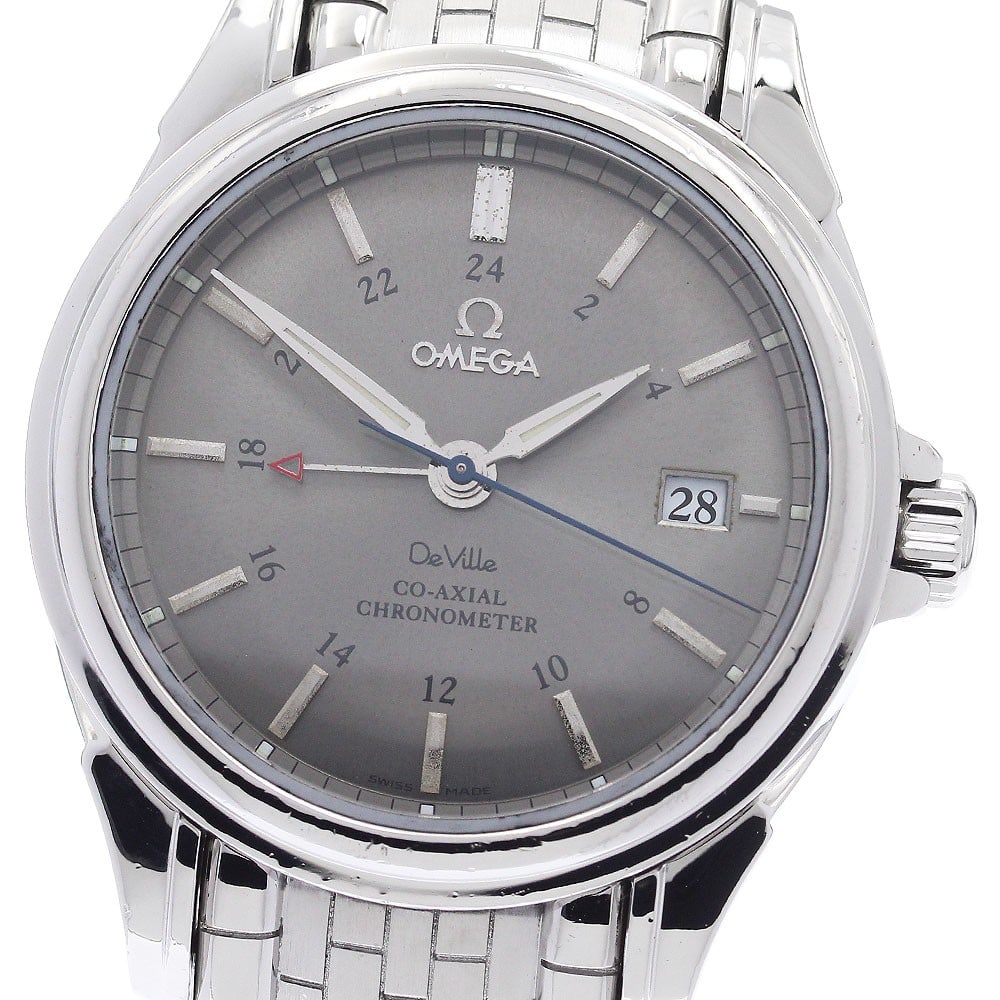 OMEGA De Ville 4533.41 GMT Automatic Mens Wristwatch: OMEGA De Ville 4533.41 GMT Automatic Mens Wristwatch Pre-owned OMEGA De Ville GMT Co-Axial automatic men's wristwatch with a gray dial and stainless steel case and bracelet. This watch-only offering f
