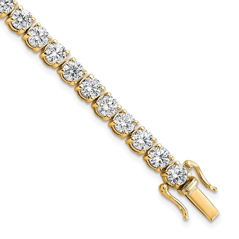 14K VS/SI+ G+ Lab Grown Diamond Tennis Bracelet: 14K VS/SI+ G+ Lab Grown Diamond Tennis Bracelet 14K VS/SI+ G+ Lab Grown Diamond Tennis Bracelet Metal: 14k Yellow Gold Weight: 16.15 grams Length: 7" This item may take 2-5 weeks for shipping. The Dia