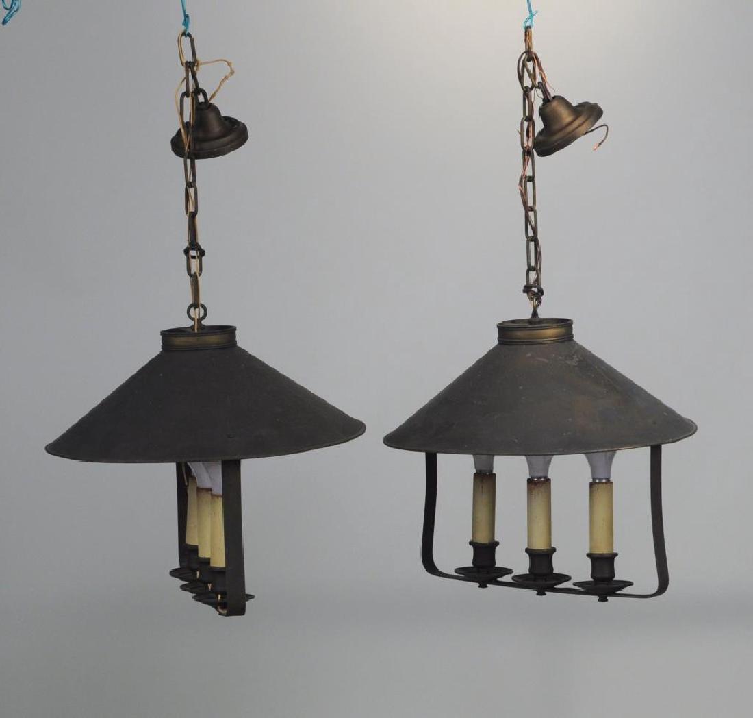 Pair Tin Three Light Hanging Lamps: Pair of tin shade three-light electrified hanging lamps, with oxidation and residue on shades. 39" high, 17 1/2" diameter. Provenance: From a 72nd Street NYC Private Collection.