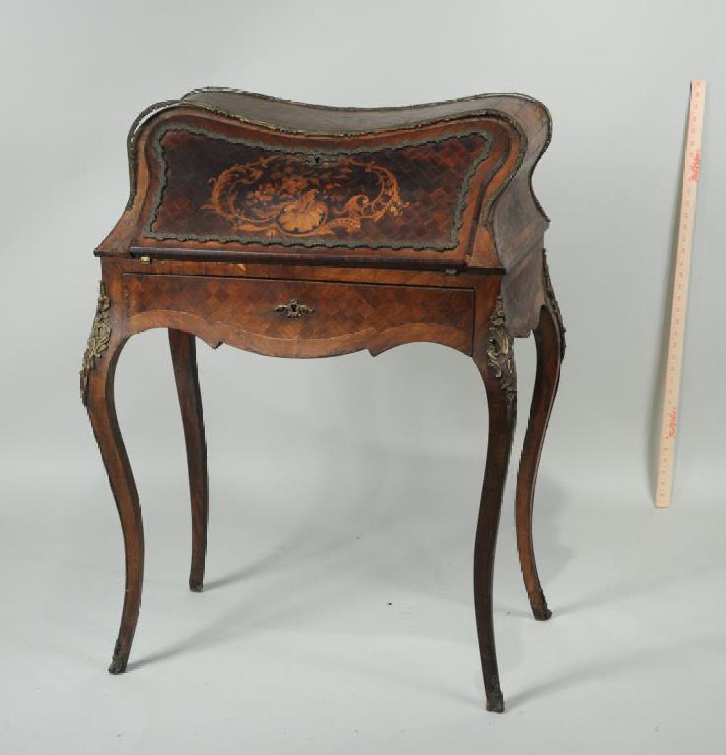 French Marquetry Ladies Desk: Parquetry, floral marquetry, and brass mounts. 38 1/2" high, 27" wide, 18" deep, in estate condition with veneer losses and loose mounts, sold as is. Provenance: Estate of Richard S. Eckstrom, Guilfor