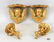 Group Four Putti Decorated Wall Brackets