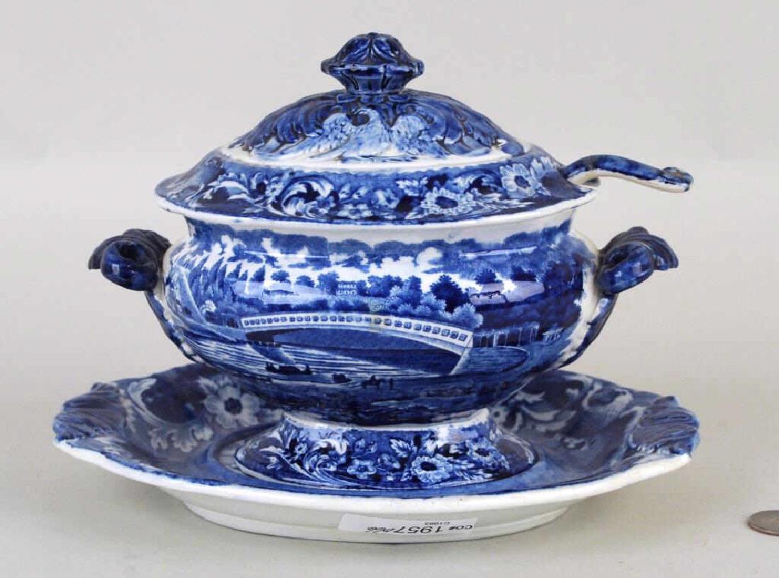 Staffordshire Historical Tureen, Ladle, Underplate: by Joseph Stubbs, Burslem, early 19th century, "Upper Ferry Bridge Over the River Schuylkill". Transfer decorated in blue and white from an engraving by Plocher after a drawing by Thomas Birch, within