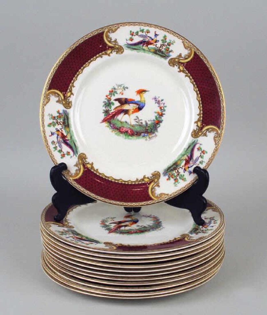 12 Myott Staffordshire Porcelain Luncheon Plates: with transfer pheasant decoration signed "A. Robert",set of twelve. Crazing, enamel, gilt wear, a few small scratches, two with stains. 9" diameter.