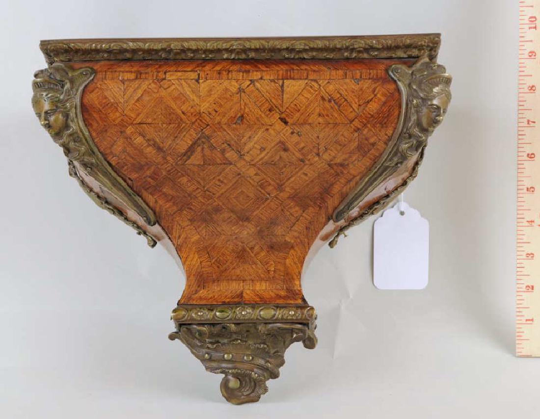Cont. Bronze Mounted Parquetry Inlaid Wall Bracket: with figural mounts. Cracks, losses, restoration. 9 1/2" high, 11" wide. Provenance: A Greenwich CT Estate.