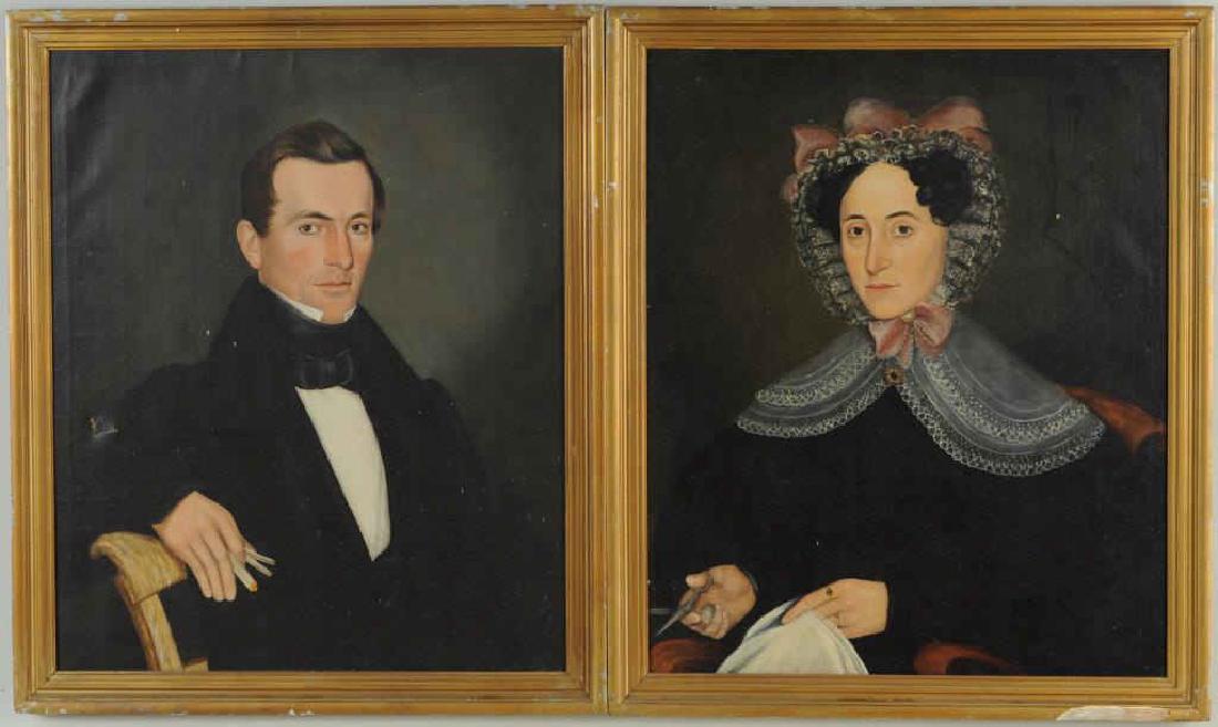 Attr. Ammi Phillips, Pair Folk Art Portraits O/C: (American, 1788-1865), the unidentified lady and gentleman depicted half length, finely attired, the lady with lace bonnet and jeweled brooch holding fabric and scissors, the gentleman holding a foldi