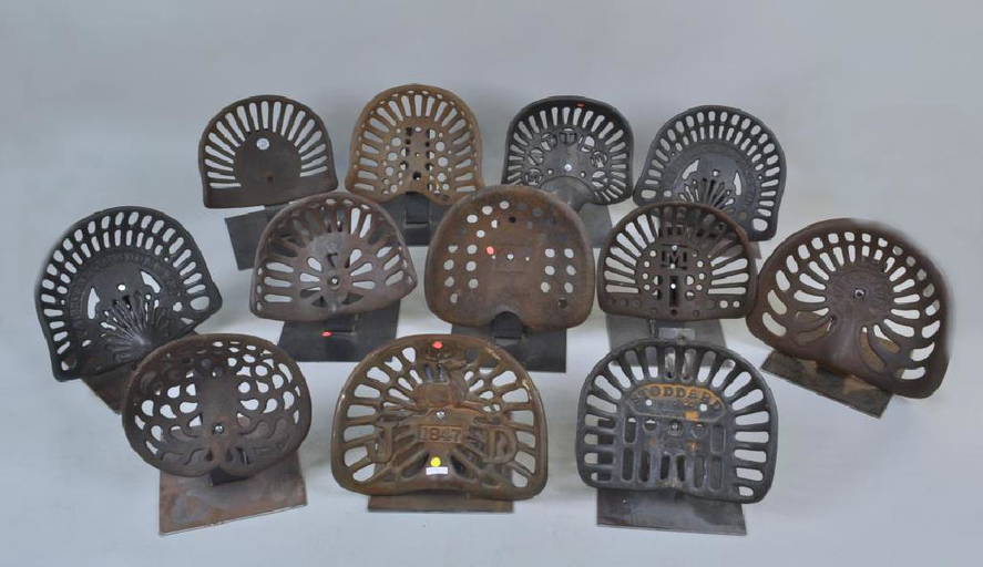 Group Twelve Vintage Cast/sheet Iron Tractor Seats