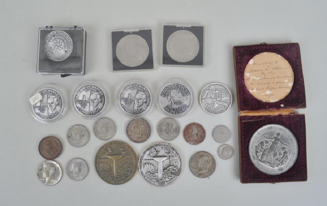 Group 22 Commemorative Medals & Coins: Group 22 Commemorative Medals & Coins including an 1876 cased Centennial American Independence Medal "Presented to Isaac L. Allen by the U.S. Centennial Commission for winning a place in the American 