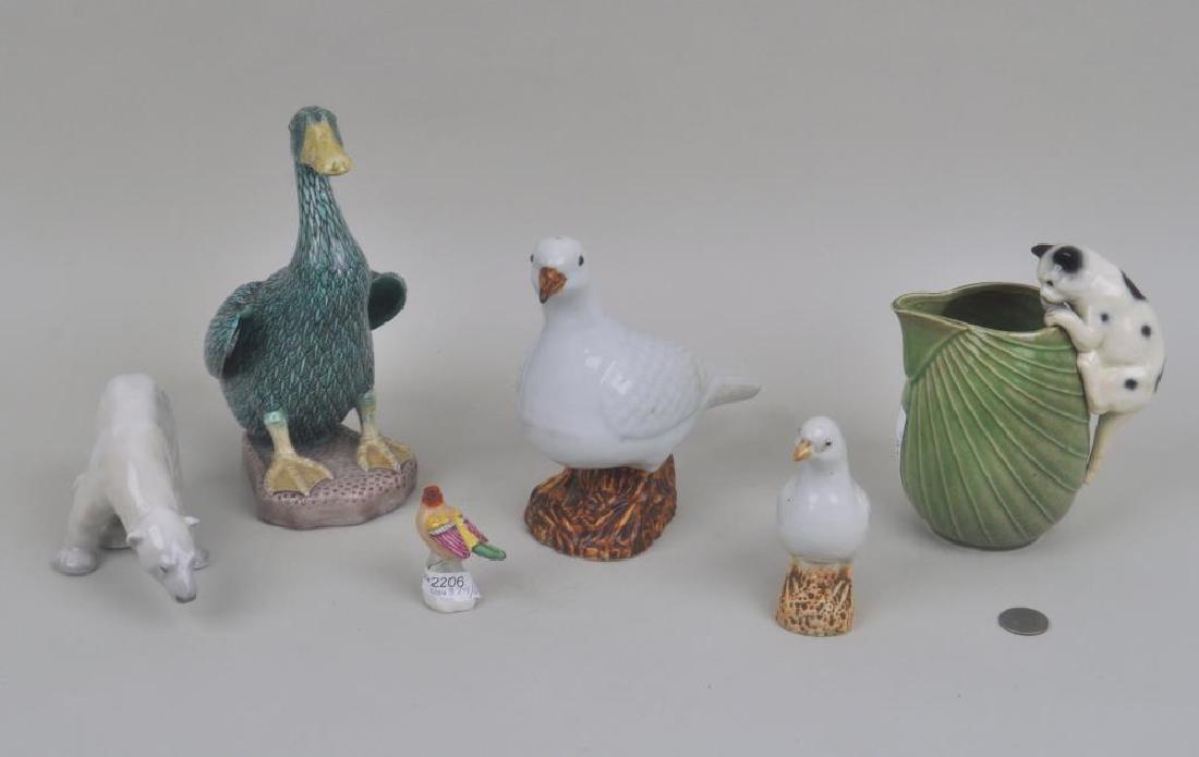 Six Porcelain Animal Figures: Six Porcelain Animal Figures comprising a Chinese duck and two pigeons, an Erphila cat pitcher, Royal Copenhagen polar bear and a small bird. Small pigeon with base chips, pitcher with crazing, hairli