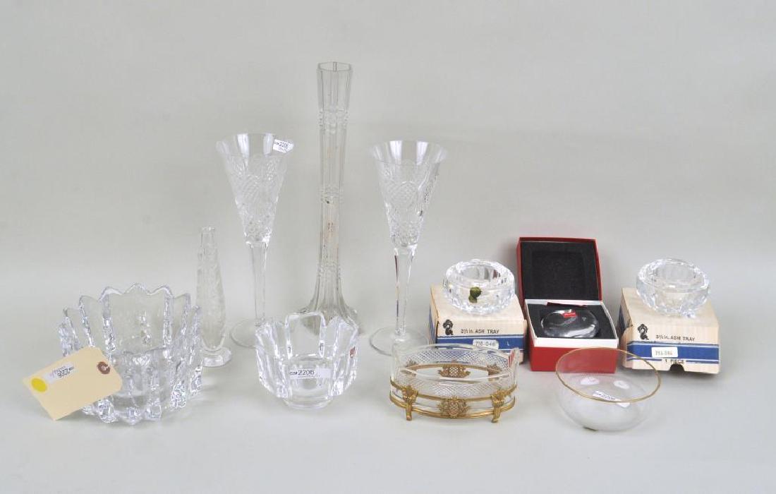 Group 11 Orrefors, Waterford & Baccarat Items: Group 11 Orrefors, Waterford & Baccarat Items comprising two Orrefors bowls, Baccarat heart, two Waterford champagne flutes and two ashtrays, a Moser bowl, gilt metal mounted oval bowl and two unsigne
