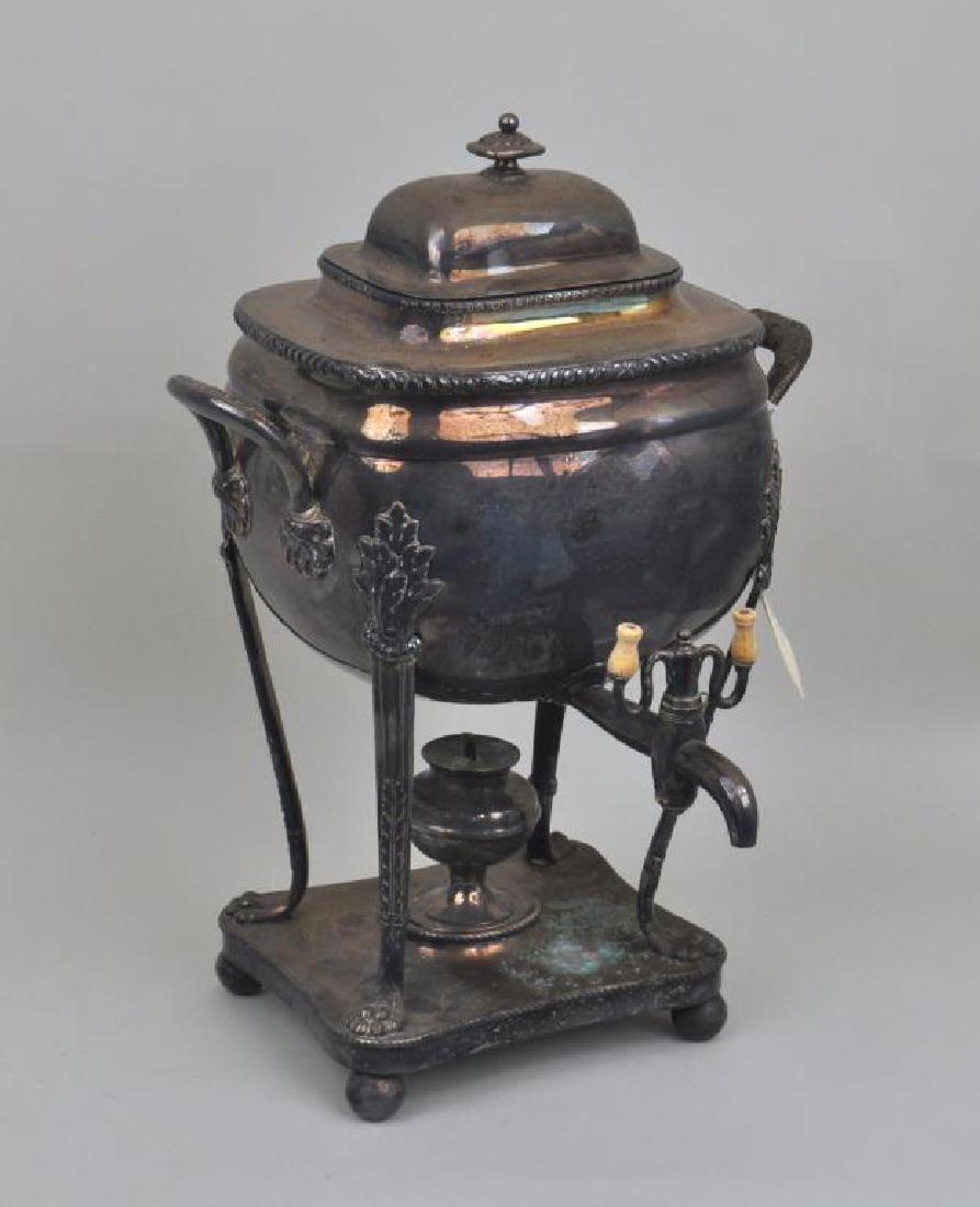 Sheffield Hot Water Urn/Burner: Sheffield Hot Water Urn/Burner on paw feet. Plate wear, loss, oxidation, cracks to insulators. 17 1/2" high, 12" wide. Provenance: Property of a Warren, CT Estate.