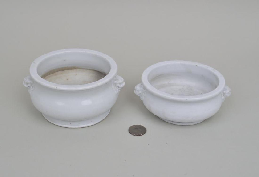 Two Similar Blanc de Chine Censers: Two Similar Blanc de Chine Censers each with lion mask lugs, 18th century. Largest: 3" high, 5" diameter.