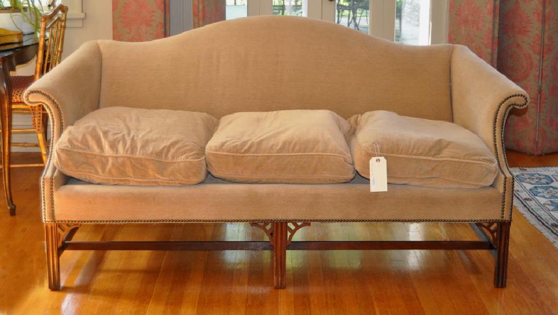 Chippendale Style Camelback Upholstered Sofa: Chippendale Style Camelback Upholstered Sofa of small size, with molded legs and pierced corner brackets. Some wear to upholstery, age and use wear. 36" high, 70" long, 32" deep. Provenance: Property 