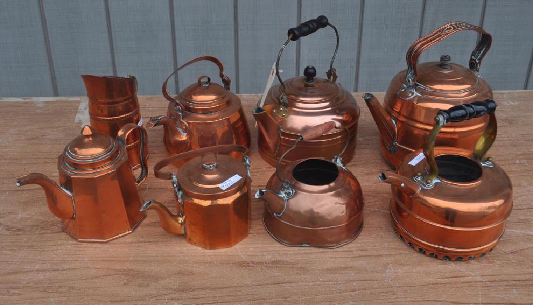 Group Eight Copper Teapots: Group Eight Copper Teapots with use wear, dents, dings, oxidation, two lacking lids. Largest: 13" high, 11" wide. Provenance: Property of a Farmington, Connecticut Estate.