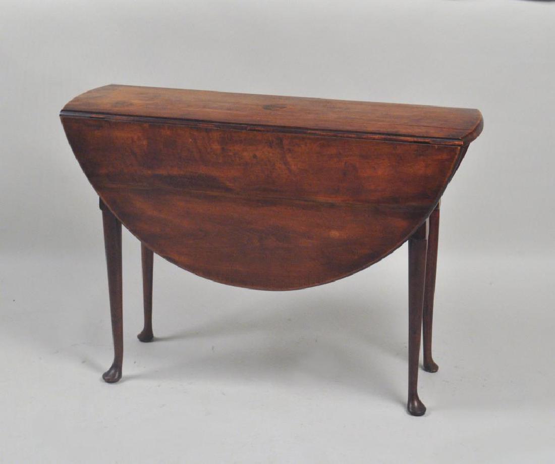 New England Queen Anne Maple Drop Leaf Table: New England Queen Anne Maple Drop Leaf Table with oval drop leaves, straight legs and pad feet, some repairs. 30" high, 16" wide, 47" long. Open: 50" wide. Provenance: Property of a Woodbury, CT Colle