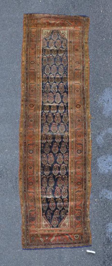 Persian Runner: Persian Runner previously mounted as stair runner, with folded edges and wear and losses, had been stapled in place. 12' 1" long, 3' 2" wide. All rugs sold as is. Provenance: Property of a Farmington,