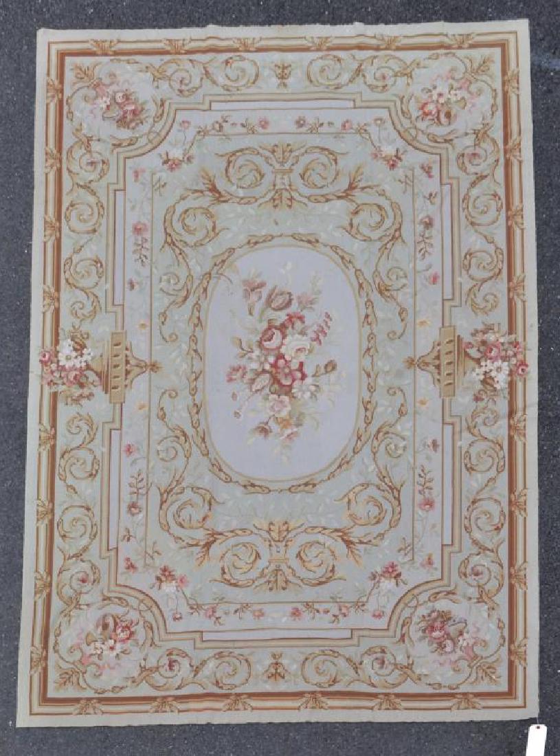 French Style Aubusson Woven Carpet: French Style Aubusson Woven Carpet with some wear, soiling. All rugs sold as is. 9' long, 6' wide. Provenance: Property of a Farmington, Connecticut Estate.