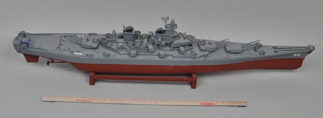 Folk Art Carved Wood Battleship Model: of the USS Missouri (BB-63).Partially mechanized, made by Harold Levy, Southbury, CT. Mr. Levy began making ship models when he moved to Heritage Village. He built the models with no kits or plans and