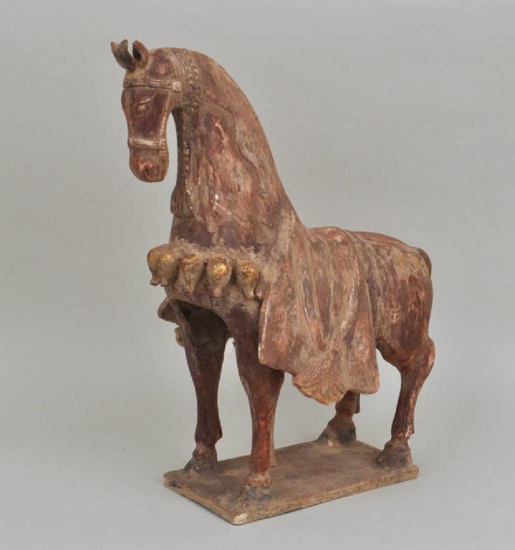 Fine Northern Wei Pottery Horse: with traces of polychrome and gilt decoration, old repair to one ear. Oxford authentication T.L. test report indicates firing between 1,000 and 1,600 years ago, consistent with suggested period of man
