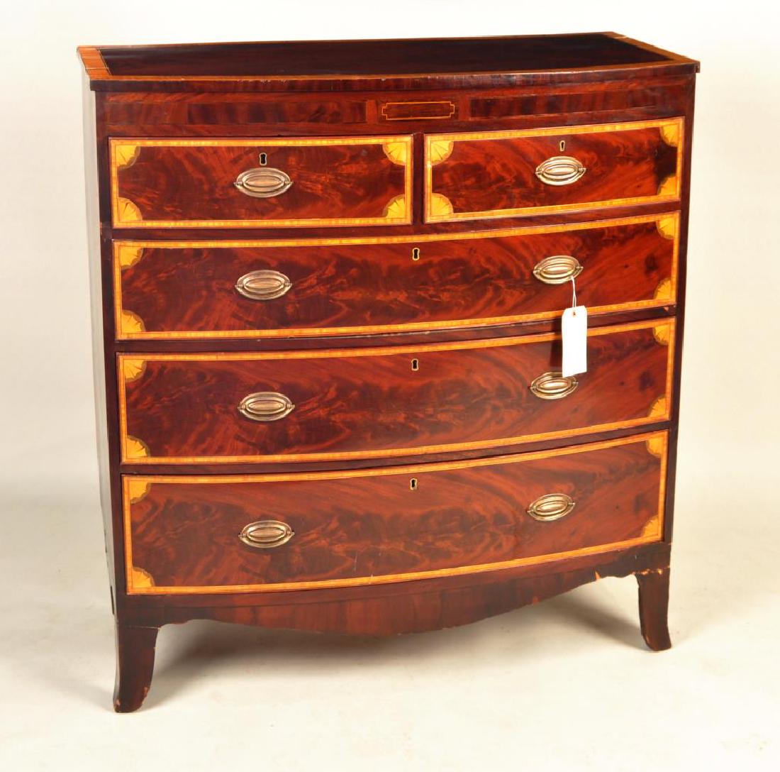 George III Inlaid Mahogany Swell Front Chest: having elaborate fan and other inlays, with veneer losses, inlay losses and breaks and repairs to feet. 45 1/4" high, 42" wide, 17 1/2" deep.