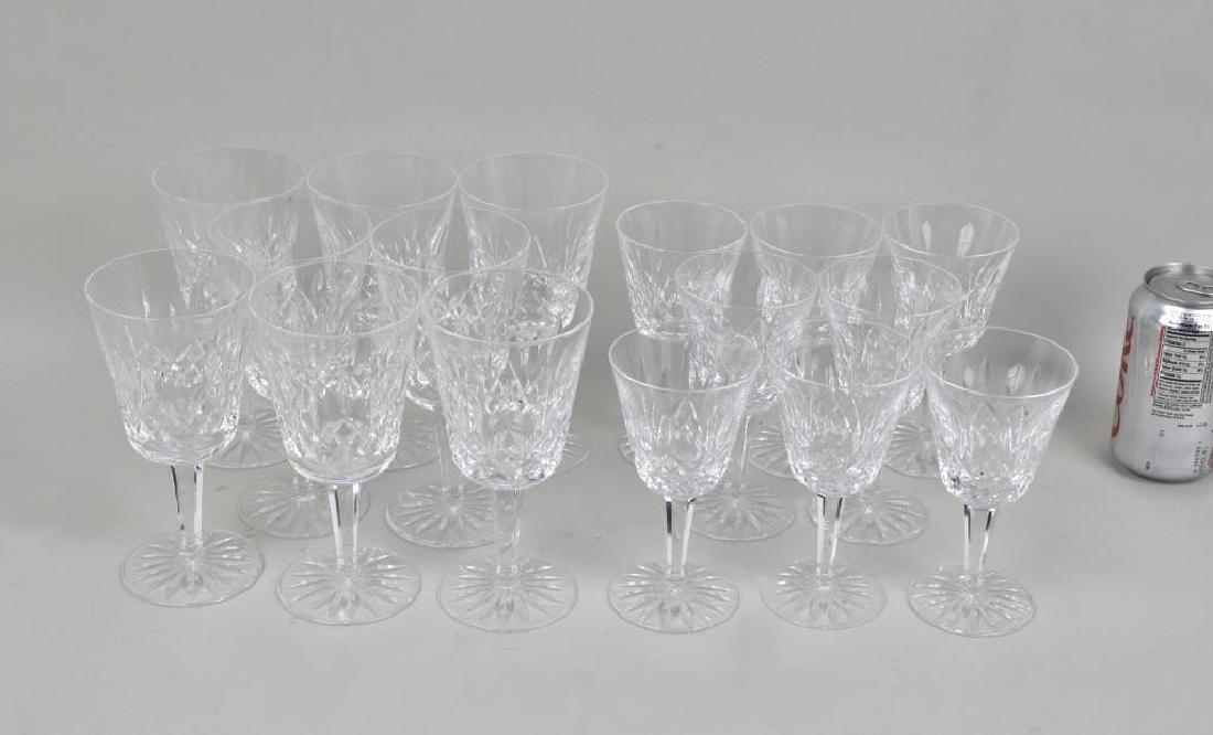 Group of Eight Waterford Goblets, Eight Wines: with edge chip to base of one wine. Largest: 7" high, 3 1/2" diameter.