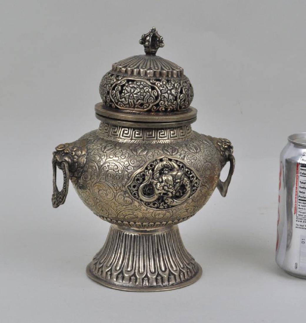 Nepalese German Silver Censer: marked "German Silver India." Dents to inner lid rim, interior residue. 9" high, 6" wide. Provenance: Property of a CT Private Collector.