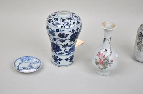 Group Chinese Porcelain Wares: a famille rose bottle vase, blue and white blossom and vine Meiping vase and a small blue and white dish. Chips to rim of bottle vase. Largest: 7 1/2" high, 4 1/2" diameter. Provenance: Property of a