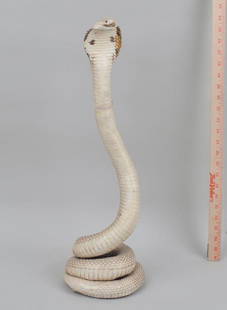 Taxidermy Mount Cobra: 22 1/4" high, 7" diameter. Tear; repair to right edge of head and tape repair to neck. Provenance: Property of a CT Private Collector.